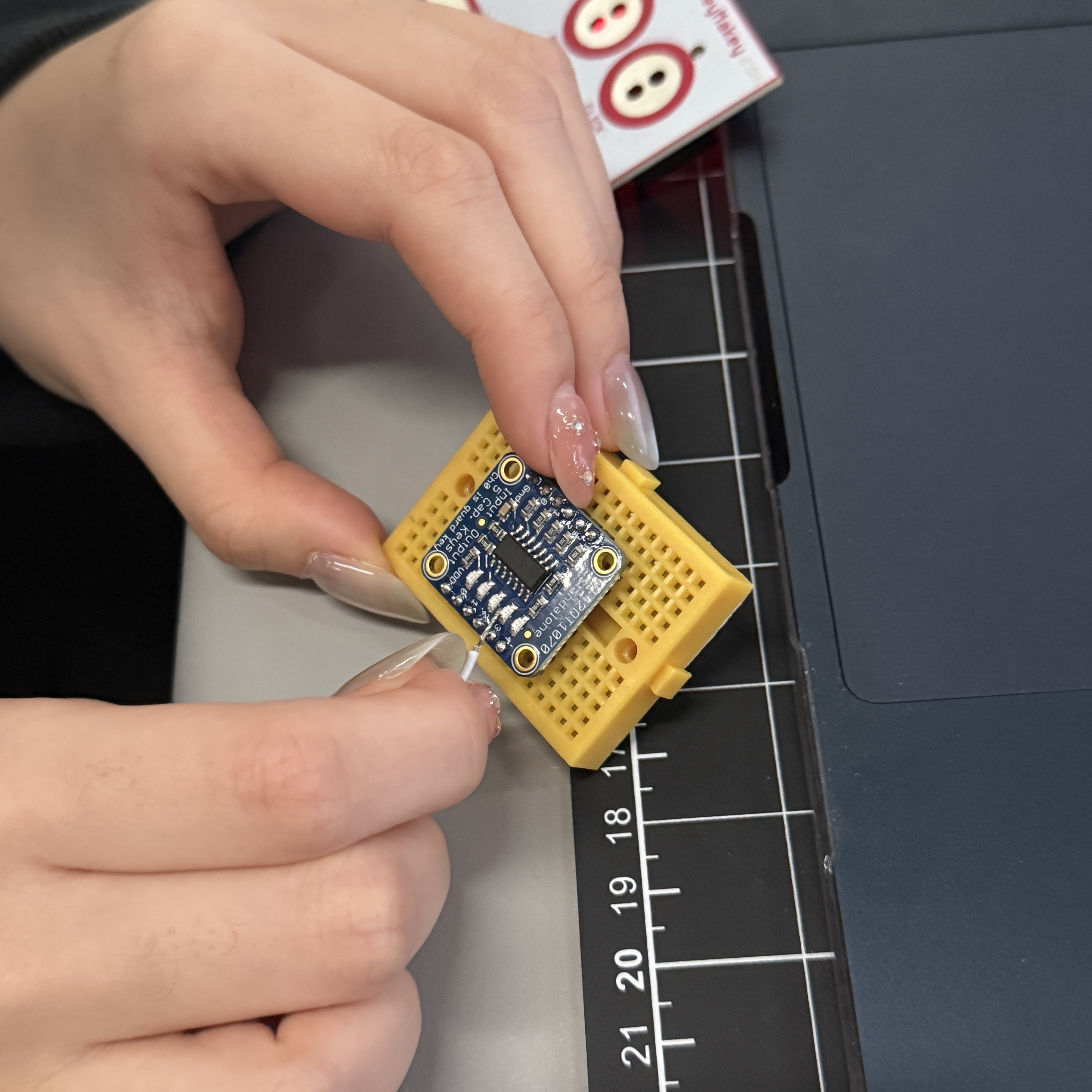 I carefully inserted the jumper wires into the breadboard, making sure each connection was in the right place.